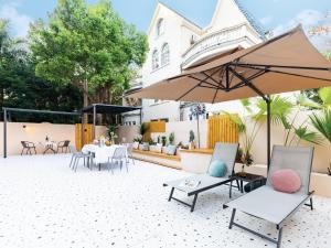 Fotografie z fotogalerie ubytování Beihai Silver Beach Yintai Time Seaview Villa Hotel v destinaci Pej-chaj