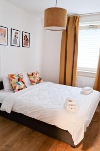 Posteľ alebo postele v izbe v ubytovaní MarOks Żółwia Apartment