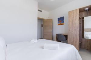 A bed or beds in a room at Le scuderie 1