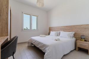 A bed or beds in a room at Le scuderie 1