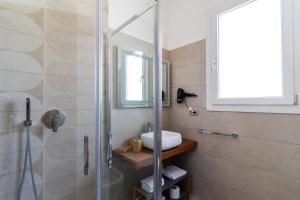 A bathroom at Le scuderie 1