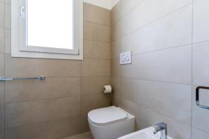 A bathroom at Le scuderie 1