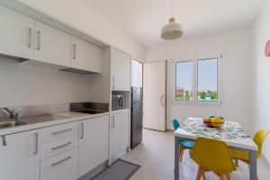 A kitchen or kitchenette at Le scuderie 1
