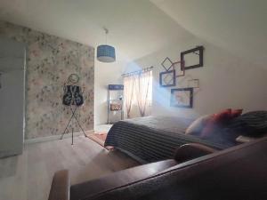 Posezení v ubytování LE CLOCOONING Chambres d'Hôtes chez l'habitant