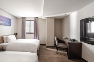 TV a/nebo společenská místnost v ubytování Hotel Yoshi
