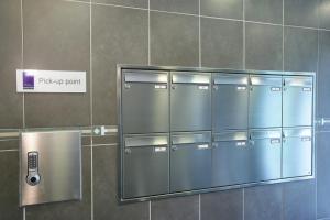 a row of metal lockers in a public restroom at Kepplestone Manor in Aberdeen