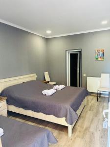 Voodi või voodid majutusasutuse Hotel Vardzia Terrace toas