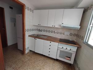Kuchyň nebo kuchyňský kout v ubytování Edificio Entremares