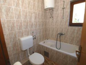 Koupelna v ubytování Apartmani Korljan