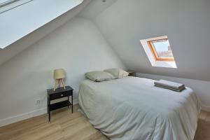 Postel nebo postele na pokoji v ubytování Maison Andrias - Charmante maison de bourg