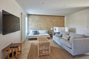 Posezení v ubytování Maison Andrias - Charmante maison de bourg