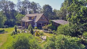 an aerial view of a house in the woods at Uneallika peamaja in Pae