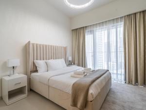 Fotografie z fotogalerie ubytování Downtown Decadence : A 1BR Urban Sanctuary v Dubaji