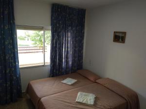 Postel nebo postele na pokoji v ubytování Edificio Entremares
