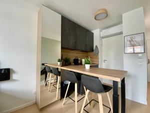 Kuchyňa alebo kuchynka v ubytovaní Les Loges de la Mer - Pérols