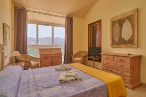 Postel nebo postele na pokoji v ubytování Casa Fuentes 2 B2 + 29 fotografií