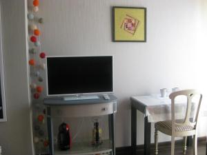 TV a/nebo společenská místnost v ubytování Aux Portes de Rennes Ch. d'hôtes