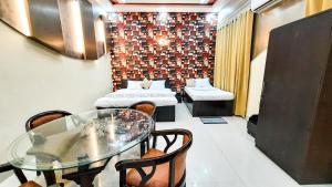 Voodi või voodid majutusasutuse Hotel Rajyashree Palace toas