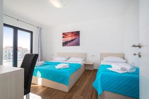 Postel nebo postele na pokoji v ubytování Villa Laura View