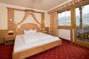 Posteľ alebo postele v izbe v ubytovaní Hotel Silberberger - Wildschönau