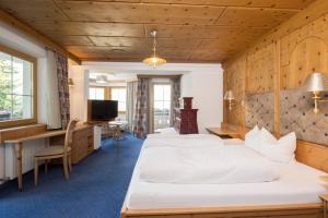 Posteľ alebo postele v izbe v ubytovaní Hotel Silberberger - Wildschönau