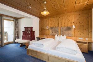 Posteľ alebo postele v izbe v ubytovaní Hotel Silberberger - Wildschönau