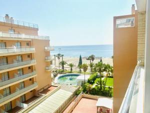 Bazén v ubytování Casa Playa Roquetas nebo v jeho okolí