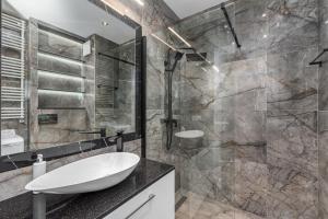Et badeværelse på Wiktoryn 6A by Homeprime