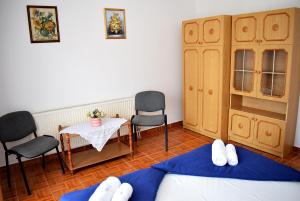 Postel nebo postele na pokoji v ubytování Nóra apartman