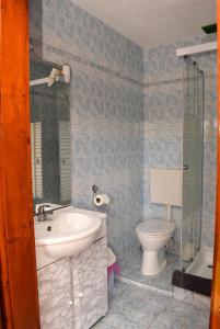 Koupelna v ubytování Nóra apartman
