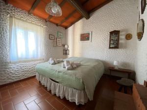 Ένα ή περισσότερα κρεβάτια σε δωμάτιο στο Villino I Balzi +42 φωτογραφίες