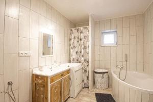 Kúpeľňa v ubytovaní Apartmán 2kk Zlámanka