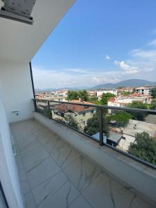 a room with a balcony with a view at 2+1 MUHTEŞEM TATİL EVİ in Dalaman