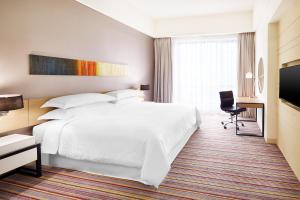 Ένα ή περισσότερα κρεβάτια σε δωμάτιο στο Four Points by Sheraton Puchong
