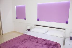 Llit o llits en una habitació de Apartments Svoboda