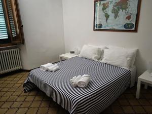 เตียงในห้องที่ Civico10, appartamento centrale con parcheggio e terrazzo