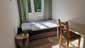 Posteľ alebo postele v izbe v ubytovaní Apartament Morski