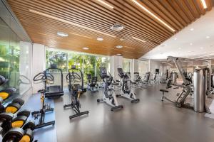 a gym with cardio machines and treadmills at NissiBlu Beach Resort in Ayia Napa