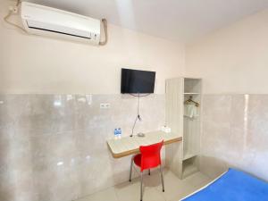 Phòng tắm tại Penginapan Star Ambon Mitra RedDoorz