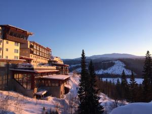 a hotel on top of a mountain in the snow at Tott studios in Åre