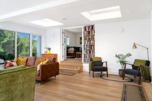 a living room with a couch and chairs at Cottage 446 - Letterfrack in Letterfrack