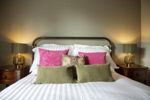 Ліжко або ліжка в номері Scala Glen Cottage