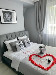 Postel nebo postele na pokoji v ubytování Pokoje Marilyn Monroe