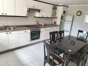 Кухня или мини-кухня в Casa de vacaciones en Vigo
