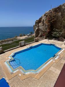 The swimming pool at or close to Ocean View Su Eminencia