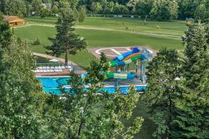 an aerial view of a water park with a water slide at Rixos-Prykarpattya Resort in Truskavets