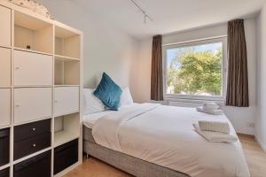 Postel nebo postele na pokoji v ubytování Villa Stuifduin