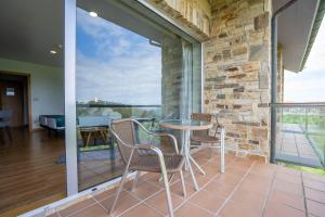 Un balcón o terraza de Abba Comillas Hotel