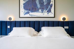 Cama o camas de una habitación en Abba Comillas Hotel