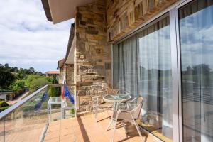 Un balcón o terraza de Abba Comillas Hotel